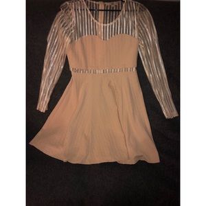 Cream-pink tinted long sleeved dress